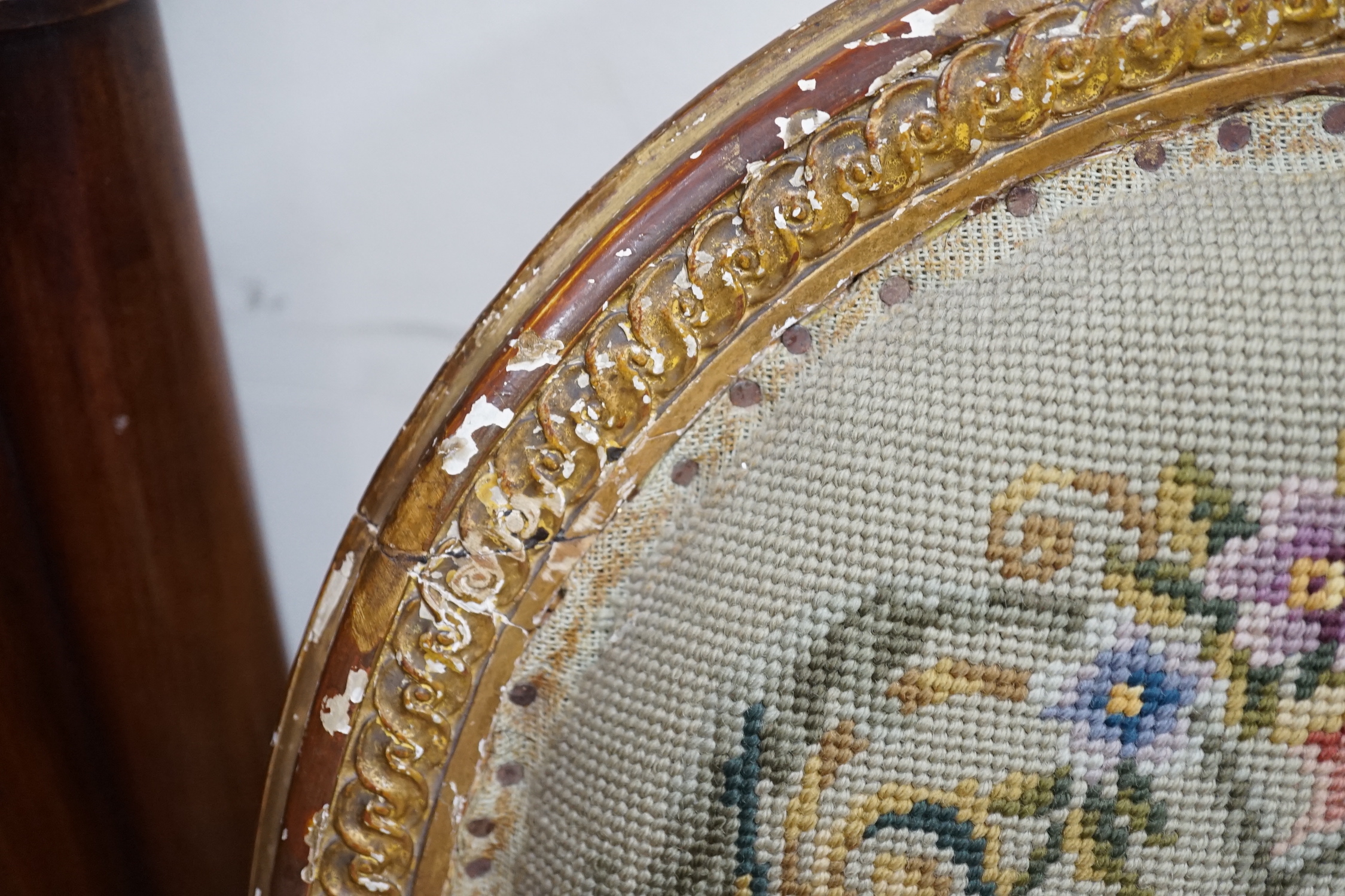 A 19th century French giltwood and composition fauteuil with tapestry upholstery, width 59cm, depth 46cm, height 90cm